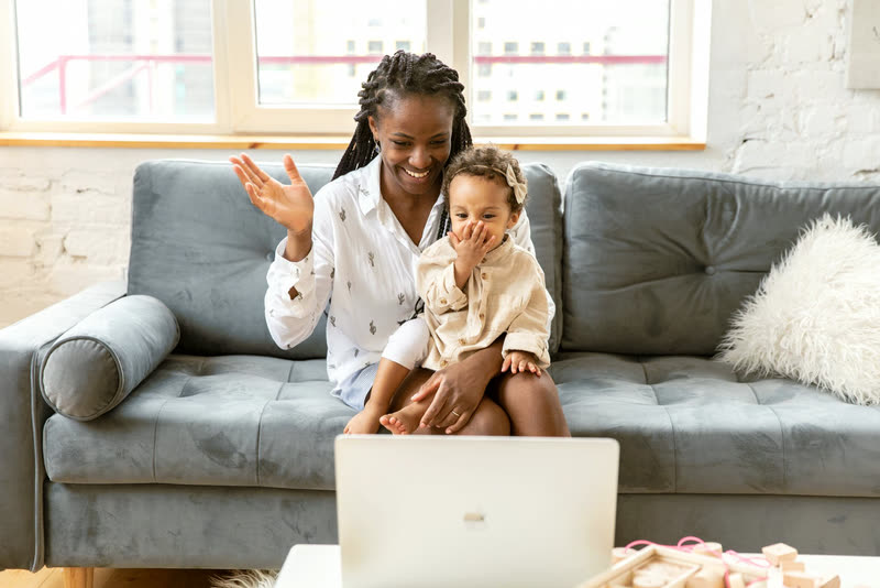 A mother and daughter joining a shower by video call