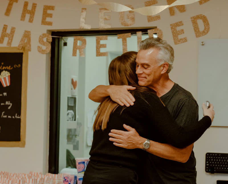 Colleagues celebrating someone at a send-off