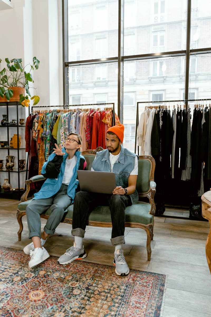 Two people planning the next chapter on a laptop