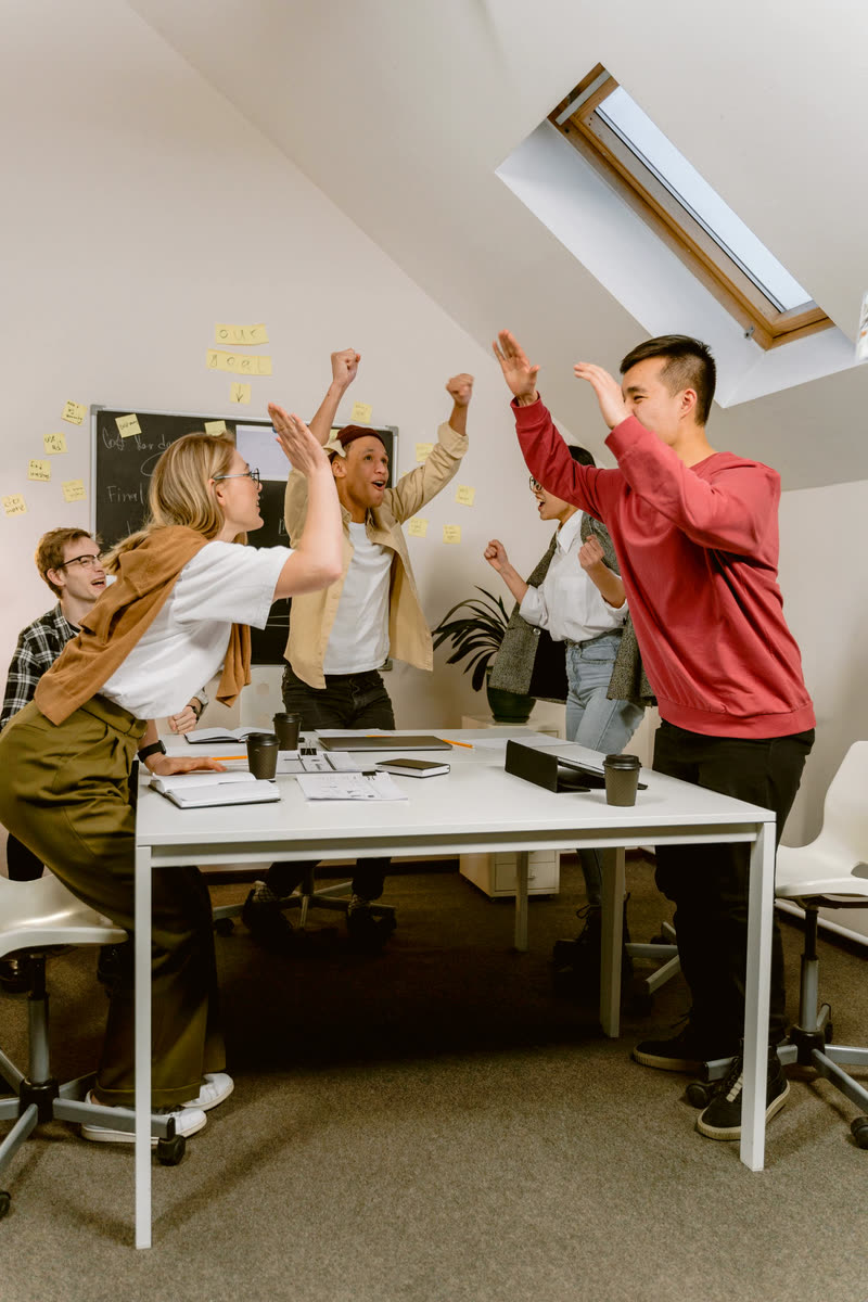 Classmates celebrating an achievement together