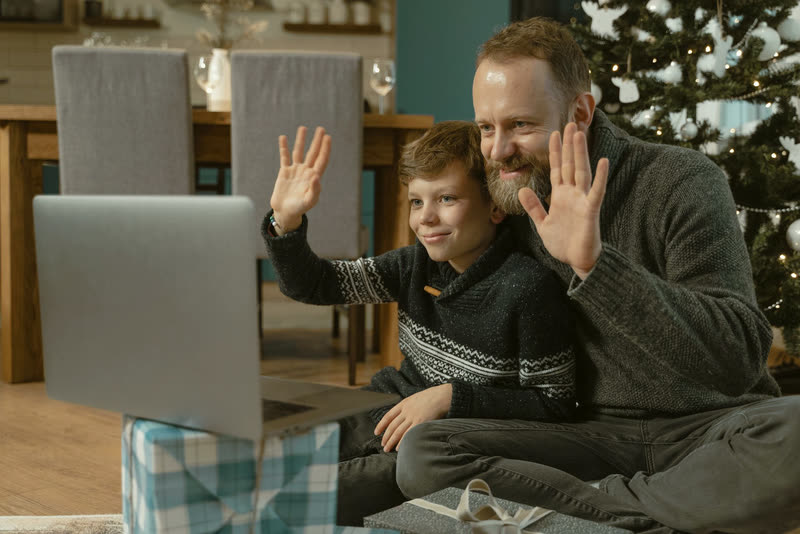 Family connecting over the holidays by video call