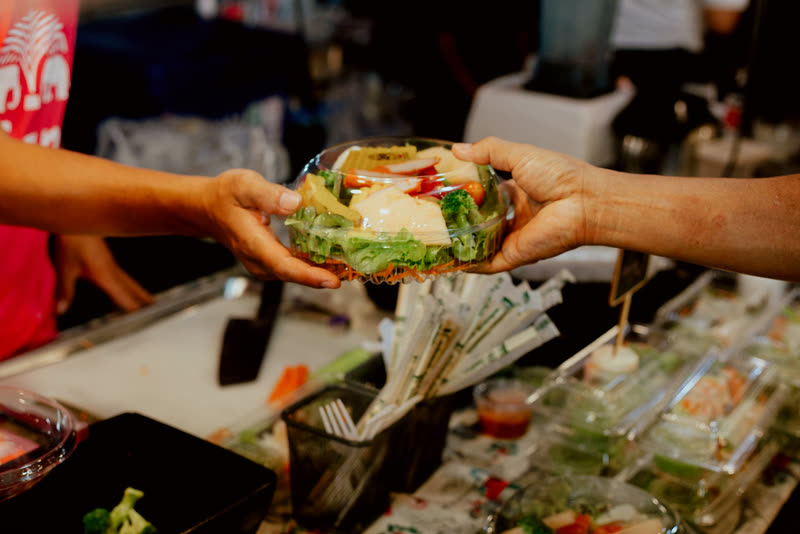 A home-cooked meal passed hand to hand