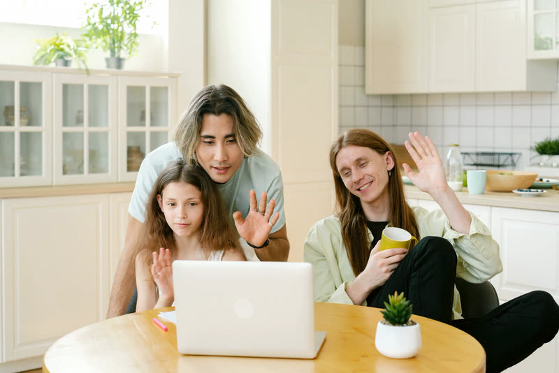 A family checking in by video call
